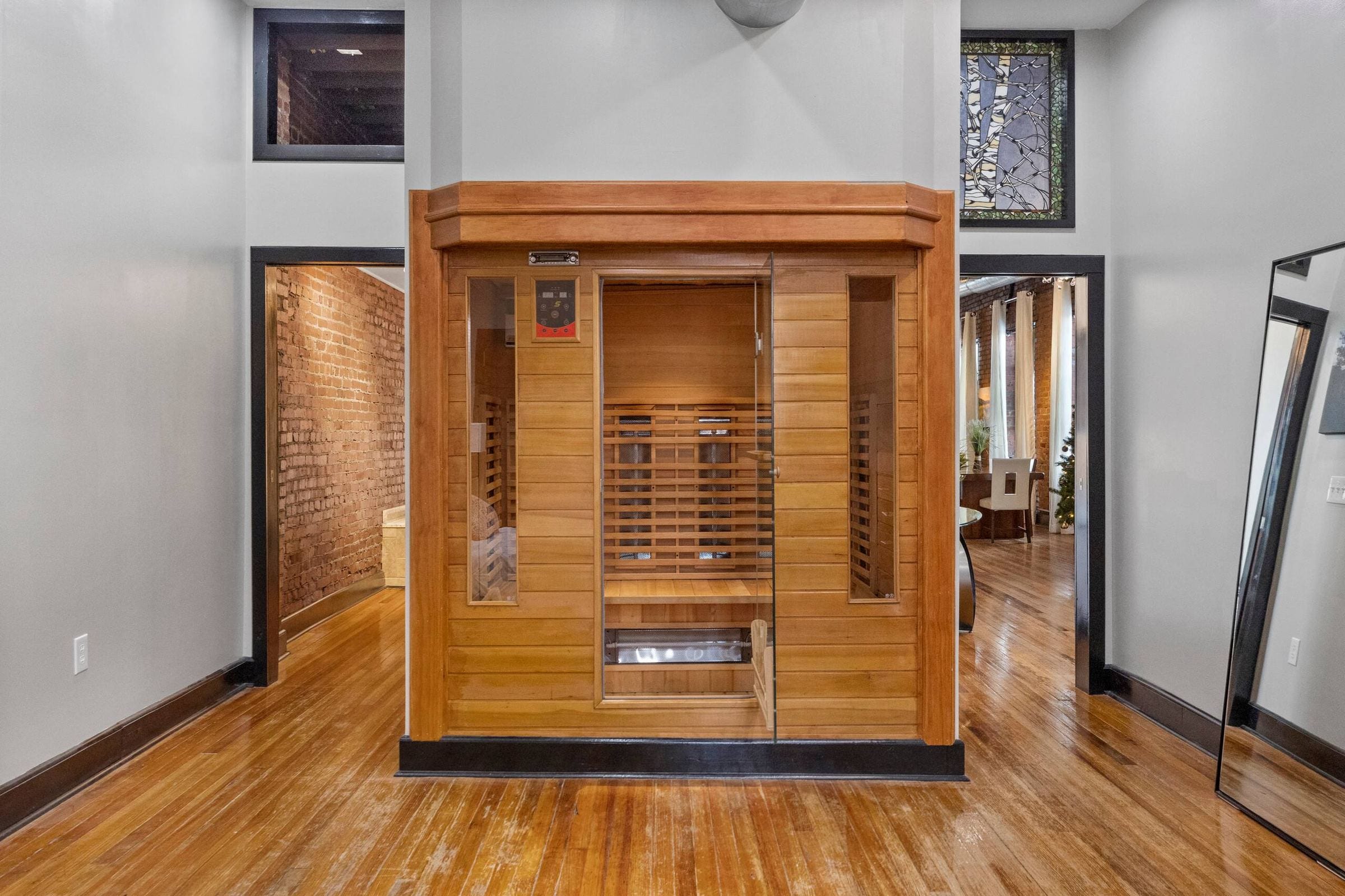 The sauna, a wood cabin standing in the bedroom.