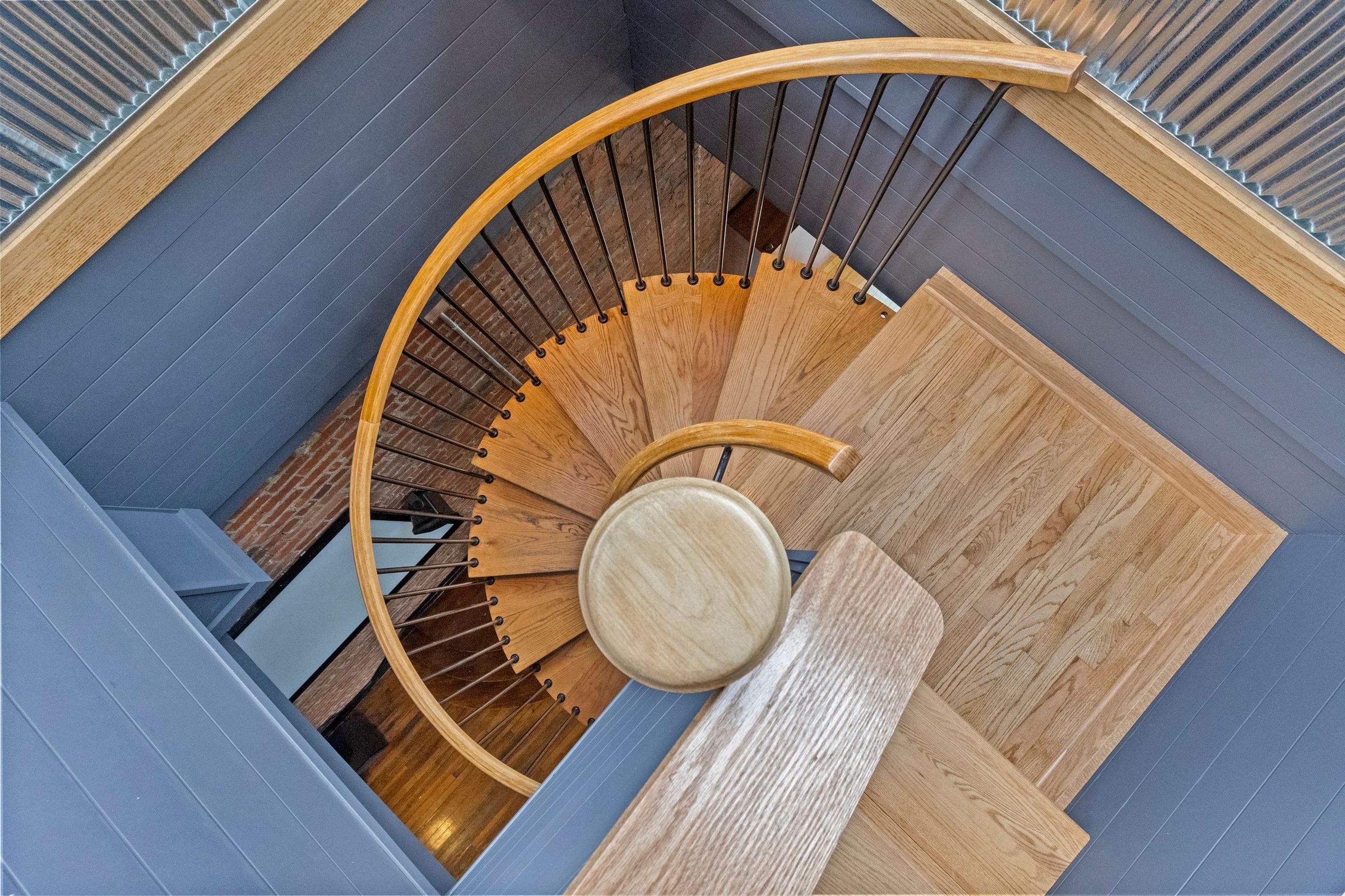 Looking straight down the spiral stair from the top.